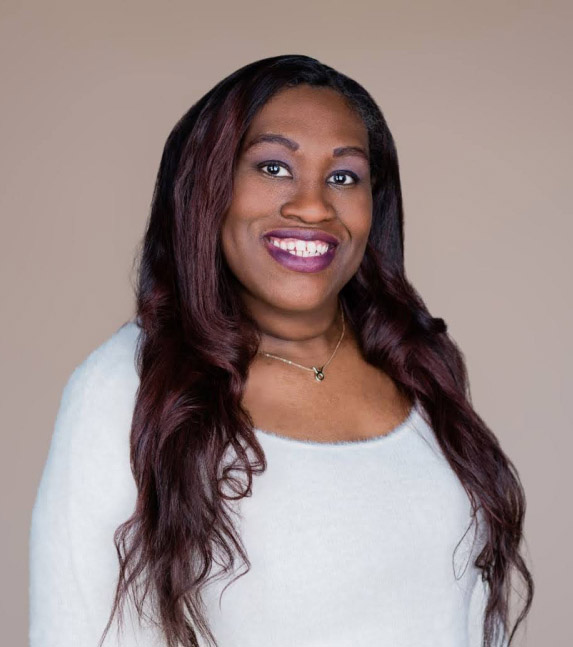 Natasha Jones smiles at the camera