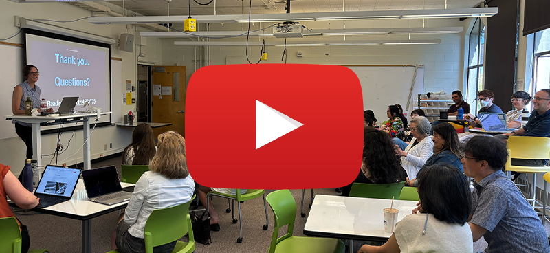 Kate Starbird stands in front of the class