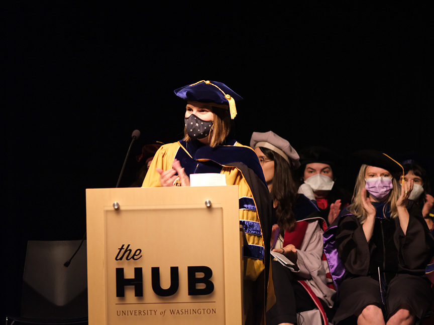 Julie Kientz at the podium at the graduation ceremony