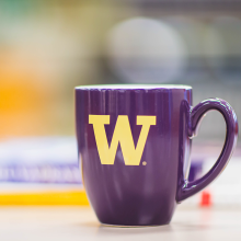 Purple coffee mug with UW W logo